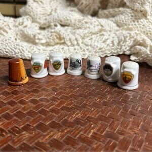 Vintage lot bundle of 7 sewing thimbles different states and a wooden one